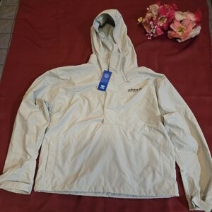 Green Adidas athletic jacket